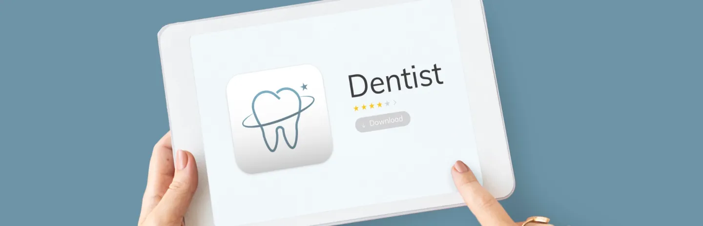 Modern dental clinic homepage displayed on laptop and smartphone, showing online appointment booking, dentist portraits.