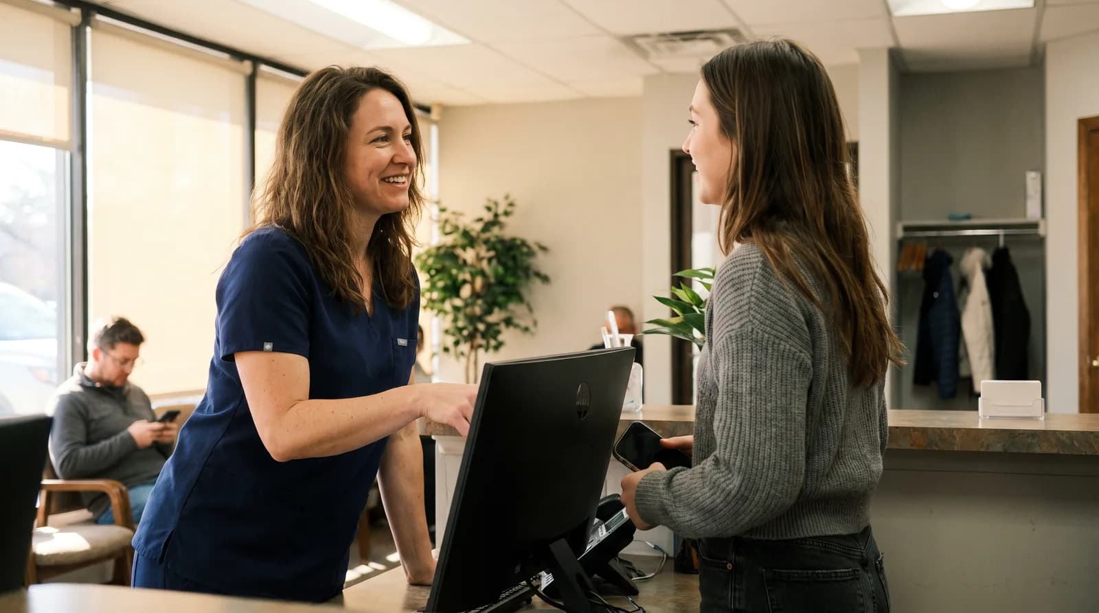 Dental new patient follow up arc showing a dentist reviewing a two-week onboarding plan at his practice