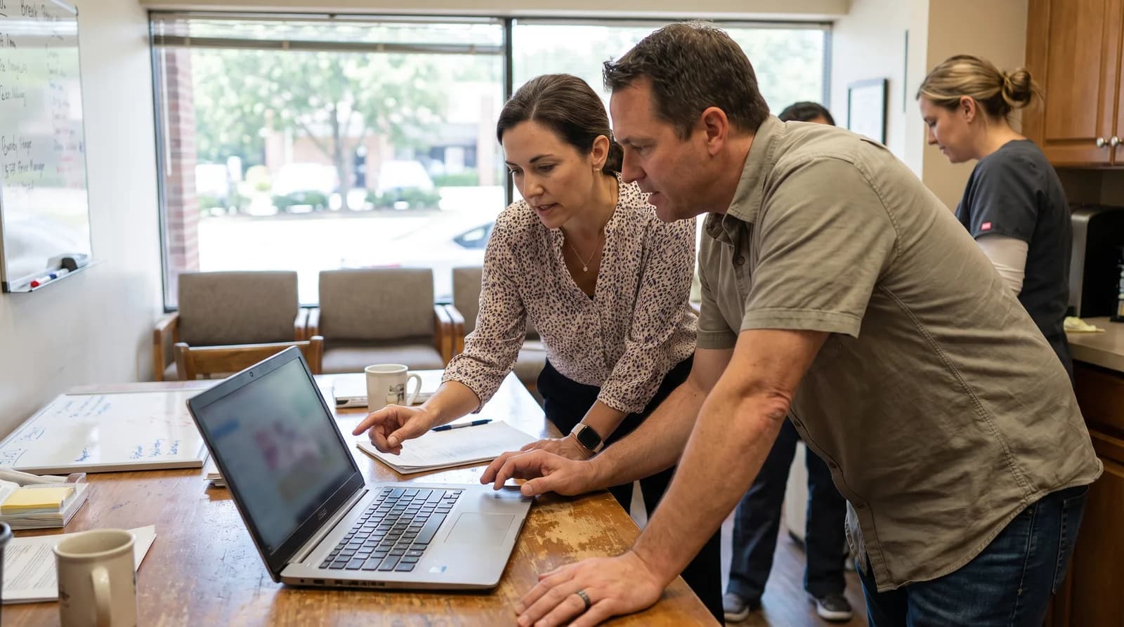 Dentist using an AI search interface in a modern practice, showing how to optimize for AI search as a dentist