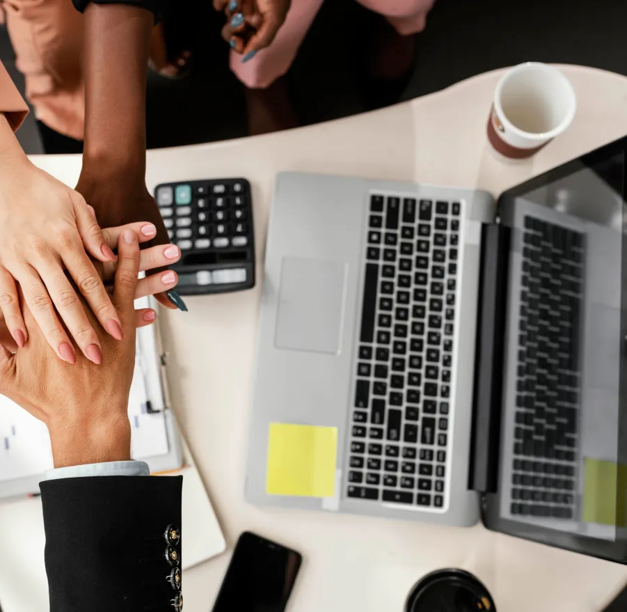 Team collaborating around a desk